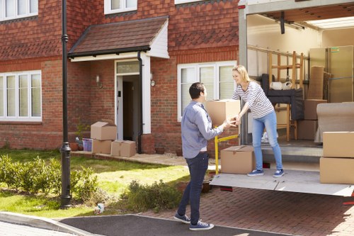 Removal team planning a move in a London street with city parking challenges