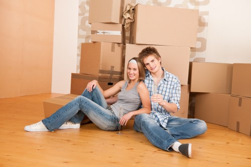 Professional packing team preparing boxes for a London home move