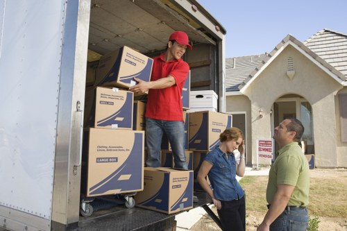 Person using an accessible moving services website with assistive technology