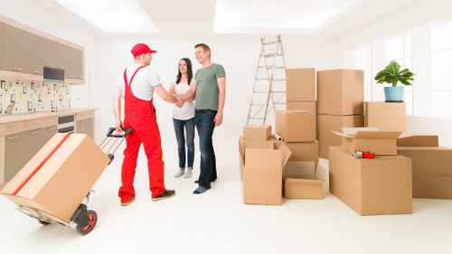 Loading furniture into a moving van in London