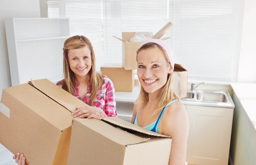 Moving team loading boxes and furniture in London